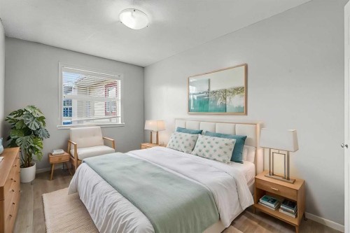2430-700 Willowbrook Road Nw, Airdrie, AB - Indoor Photo Showing Bedroom