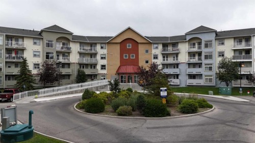 2430-700 Willowbrook Road Nw, Airdrie, AB - Outdoor With Balcony With Facade
