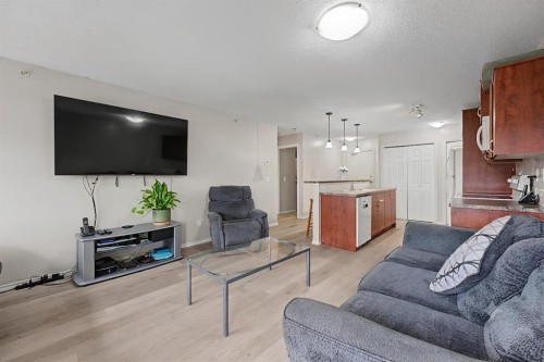 2430-700 Willowbrook Road Nw, Airdrie, AB - Indoor Photo Showing Living Room