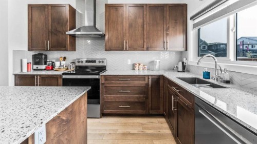 1813 Cornerstone Boulevard Ne, Calgary, AB - Indoor Photo Showing Kitchen With Double Sink With Upgraded Kitchen