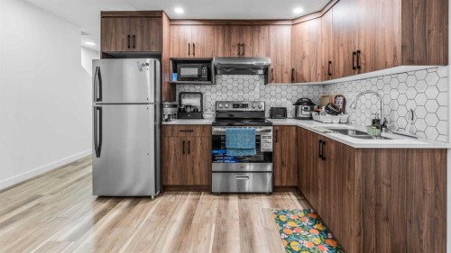 1813 Cornerstone Boulevard Ne, Calgary, AB - Indoor Photo Showing Kitchen With Double Sink
