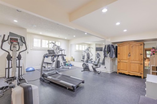 116 Lynx Ridge Road Nw, Calgary, AB - Indoor Photo Showing Gym Room