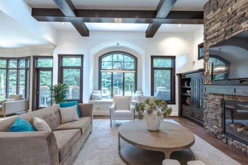 116 Lynx Ridge Road Nw, Calgary, AB - Indoor Photo Showing Living Room With Fireplace