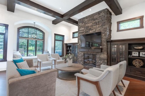 116 Lynx Ridge Road Nw, Calgary, AB - Indoor Photo Showing Living Room With Fireplace