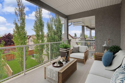 205-15 Everstone Drive Sw, Calgary, AB - Outdoor With Deck Patio Veranda With Exterior