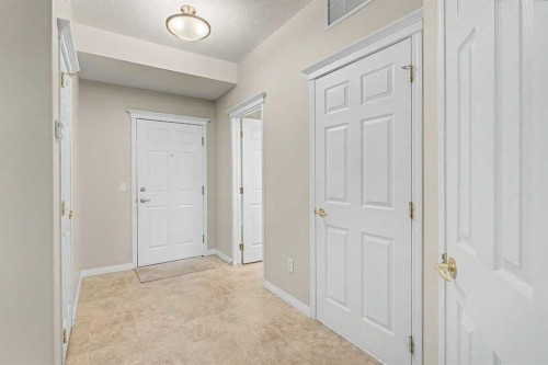 205-15 Everstone Drive Sw, Calgary, AB - Indoor Photo Showing Other Room