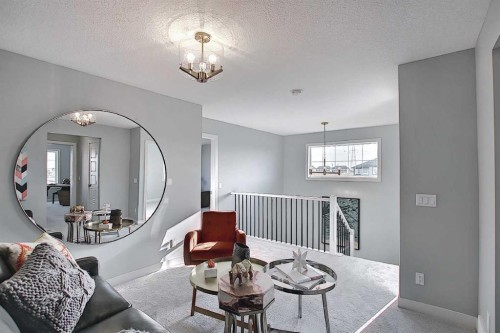 16 Topaz Place, Cochrane, AB - Indoor Photo Showing Living Room