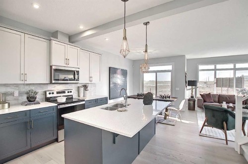 16 Topaz Place, Cochrane, AB - Indoor Photo Showing Kitchen With Double Sink With Upgraded Kitchen