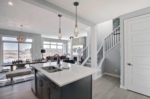 16 Topaz Place, Cochrane, AB - Indoor Photo Showing Kitchen With Double Sink