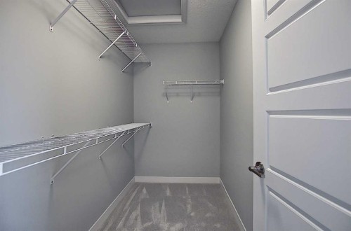16 Topaz Place, Cochrane, AB - Indoor With Storage