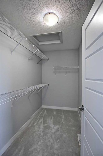 16 Topaz Place, Cochrane, AB - Indoor With Storage