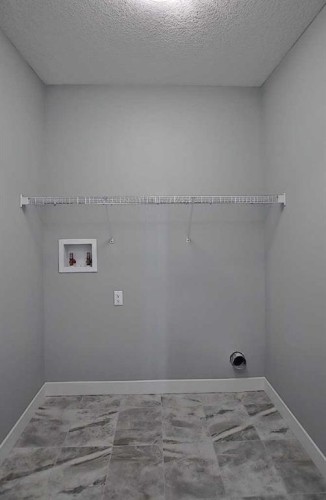 16 Topaz Place, Cochrane, AB - Indoor With Storage