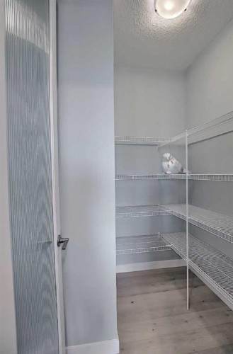 16 Topaz Place, Cochrane, AB - Indoor With Storage