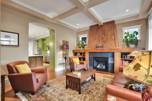 729 26 Avenue Nw, Calgary, AB - Indoor Photo Showing Living Room With Fireplace