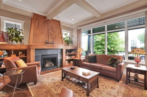 729 26 Avenue Nw, Calgary, AB - Indoor Photo Showing Living Room With Fireplace