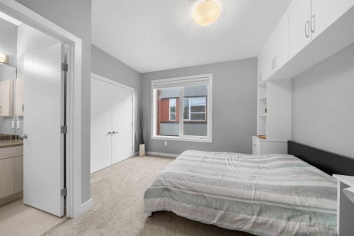 110-129 23 Avenue Ne, Calgary, AB - Indoor Photo Showing Bedroom