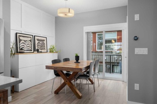 110-129 23 Avenue Ne, Calgary, AB - Indoor Photo Showing Dining Room