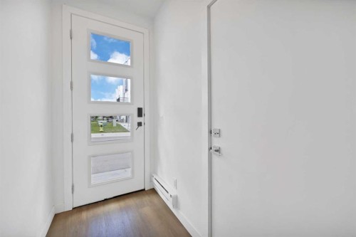 209-101 Panatella Square Nw, Calgary, AB - Indoor Photo Showing Other Room