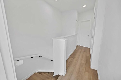 209-101 Panatella Square Nw, Calgary, AB - Indoor Photo Showing Other Room