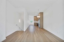 209-101 Panatella Square NW Calgary, AB T3K 2R9