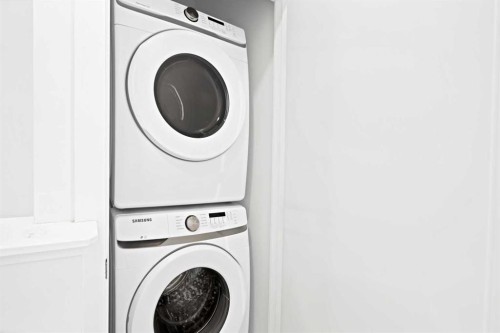 209-101 Panatella Square Nw, Calgary, AB - Indoor Photo Showing Laundry Room