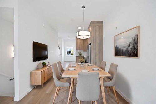 209-101 Panatella Square Nw, Calgary, AB - Indoor Photo Showing Dining Room