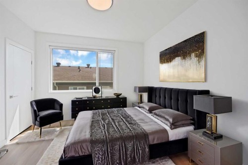 209-101 Panatella Square Nw, Calgary, AB - Indoor Photo Showing Bedroom