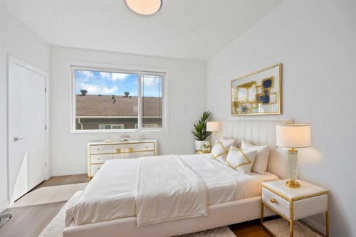 209-101 Panatella Square Nw, Calgary, AB - Indoor Photo Showing Bedroom
