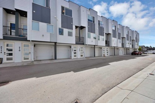 209-101 Panatella Square Nw, Calgary, AB - Outdoor With Facade