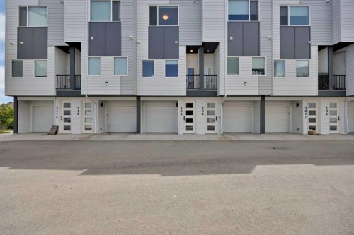 209-101 Panatella Square Nw, Calgary, AB - Outdoor With Facade