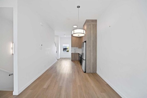 209-101 Panatella Square Nw, Calgary, AB - Indoor Photo Showing Other Room