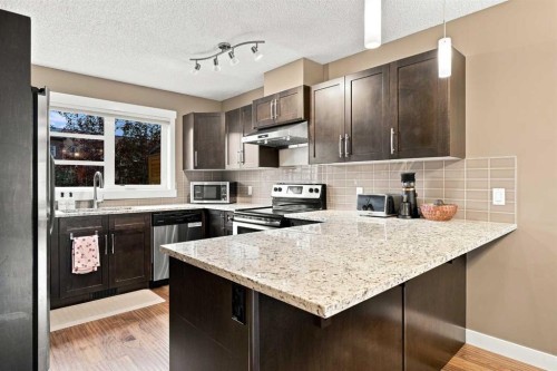 231 Covecreek Circle Ne, Calgary, AB - Indoor Photo Showing Kitchen With Upgraded Kitchen