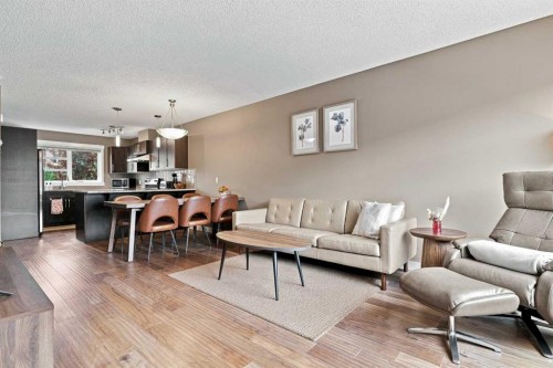 231 Covecreek Circle Ne, Calgary, AB - Indoor Photo Showing Living Room