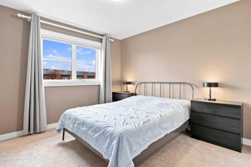 231 Covecreek Circle Ne, Calgary, AB - Indoor Photo Showing Bedroom