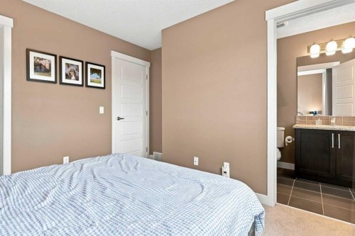 231 Covecreek Circle Ne, Calgary, AB - Indoor Photo Showing Bedroom