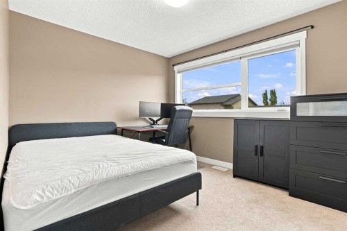 231 Covecreek Circle Ne, Calgary, AB - Indoor Photo Showing Bedroom