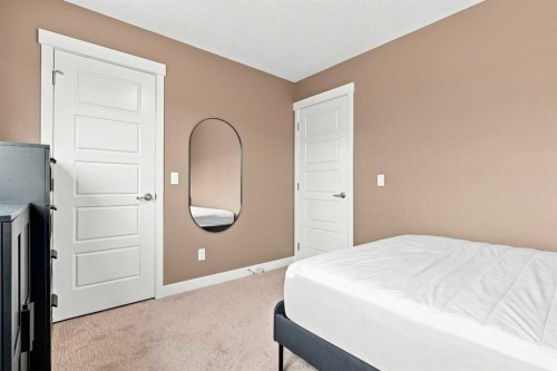231 Covecreek Circle Ne, Calgary, AB - Indoor Photo Showing Bedroom