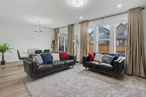 67 Copperhead Grove Se, Calgary, AB - Indoor Photo Showing Living Room