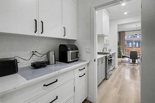 67 Copperhead Grove Se, Calgary, AB - Indoor Photo Showing Kitchen With Upgraded Kitchen