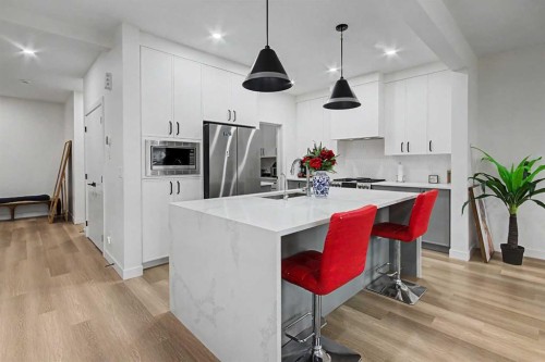 67 Copperhead Grove Se, Calgary, AB - Indoor Photo Showing Kitchen With Upgraded Kitchen