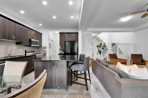 122 Windridge Road Sw, Airdrie, AB - Indoor Photo Showing Kitchen With Upgraded Kitchen