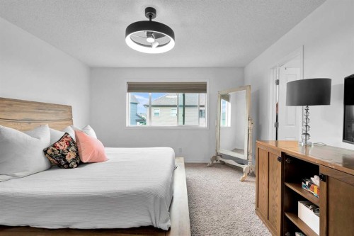 122 Windridge Road Sw, Airdrie, AB - Indoor Photo Showing Bedroom