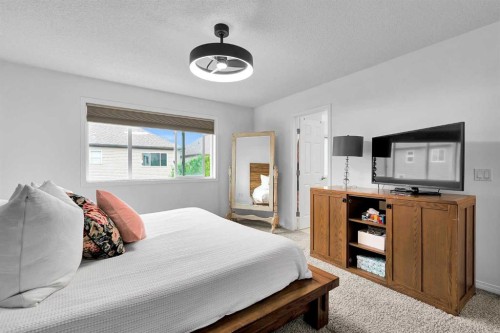 122 Windridge Road Sw, Airdrie, AB - Indoor Photo Showing Bedroom