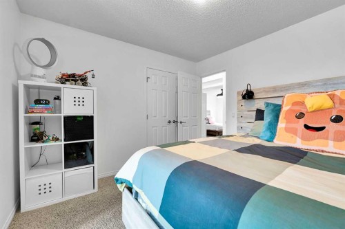 122 Windridge Road Sw, Airdrie, AB - Indoor Photo Showing Bedroom