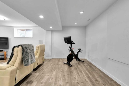 122 Windridge Road Sw, Airdrie, AB - Indoor Photo Showing Gym Room