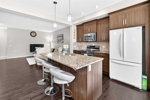 98 Saddlelake Terrace, Calgary, AB - Indoor Photo Showing Kitchen With Double Sink