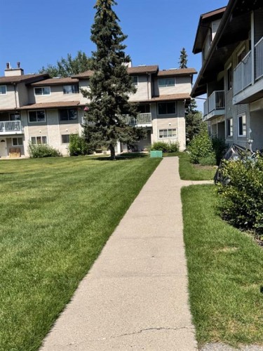 1111-200 Brookpark Drive Sw, Calgary, AB - Outdoor With Facade