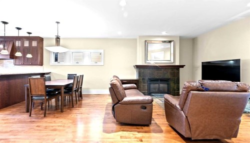 1428 2A Street Nw, Calgary, AB - Indoor Photo Showing Living Room With Fireplace