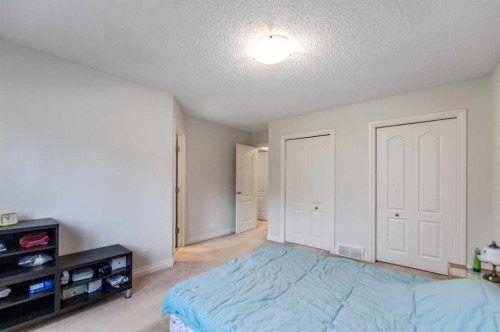 10 Evansmeade Manor Nw, Calgary, AB - Indoor Photo Showing Bedroom
