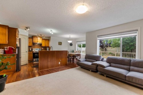 10 Evansmeade Manor Nw, Calgary, AB - Indoor Photo Showing Living Room